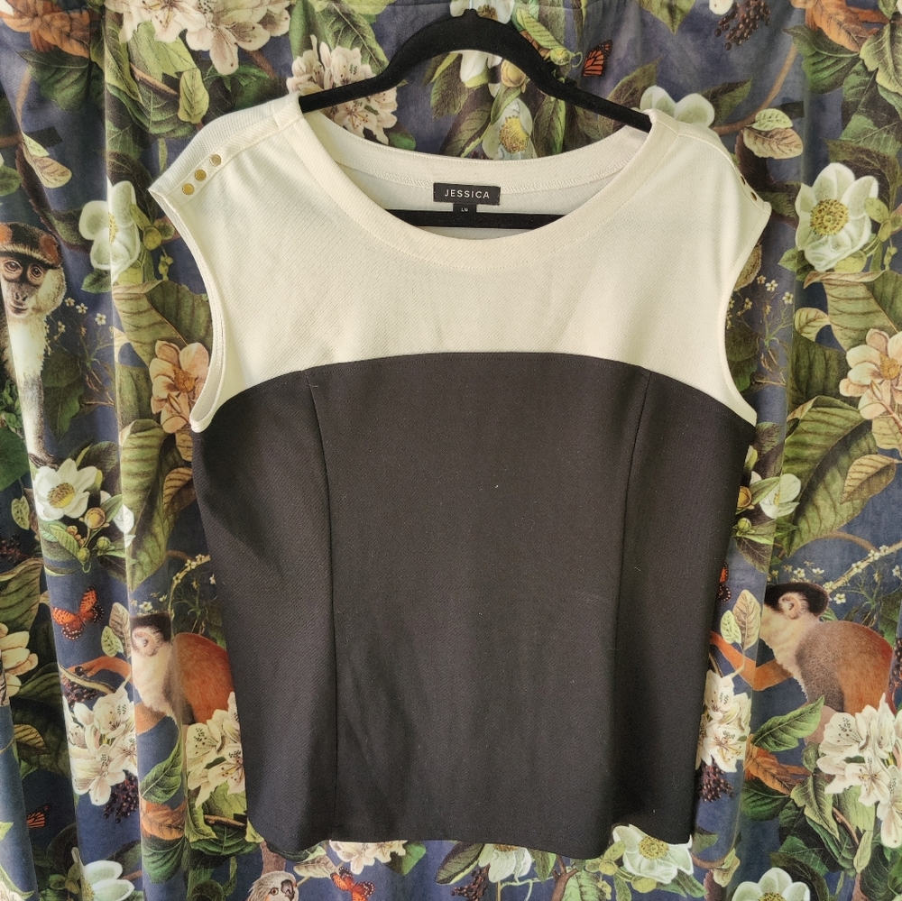 Black & white sleeveless top with button detail